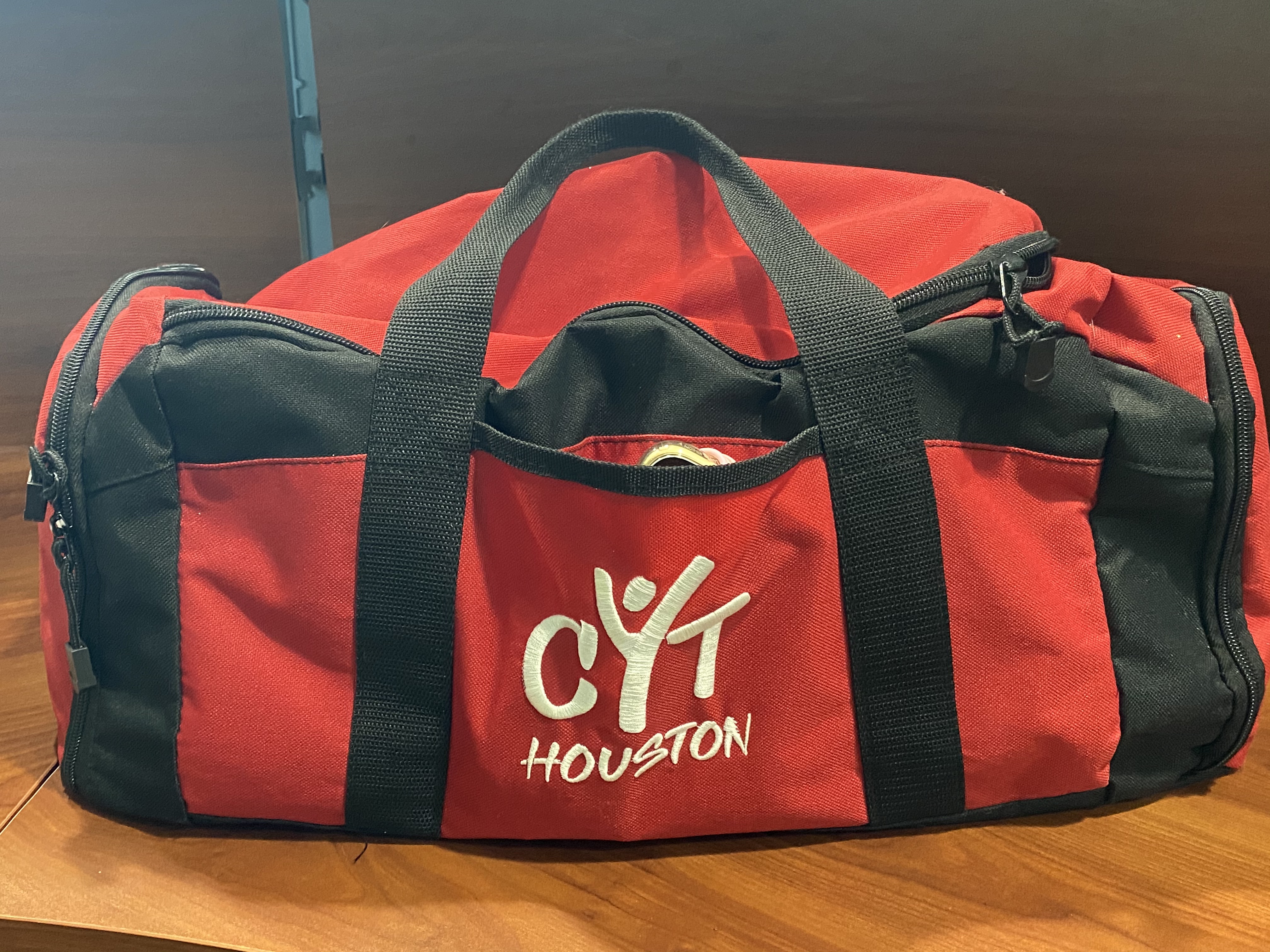 Duffle Bag<br />
<br />
Each bag has the CYT Logo Embroidered into the front pocket.  These are fantastic for rehearsals and as greenroom bags.  Each bag has a shoe pocket on the end, so students can keep their shoes separate from all their undergarments, phones, etc.