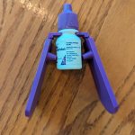 12) Eye Drop Squeezer - Assists in application for people with grip strength difficulties