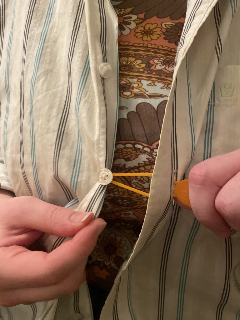 4) Button Helper - A dressing aid that is great for hard-to-grasp buttons.