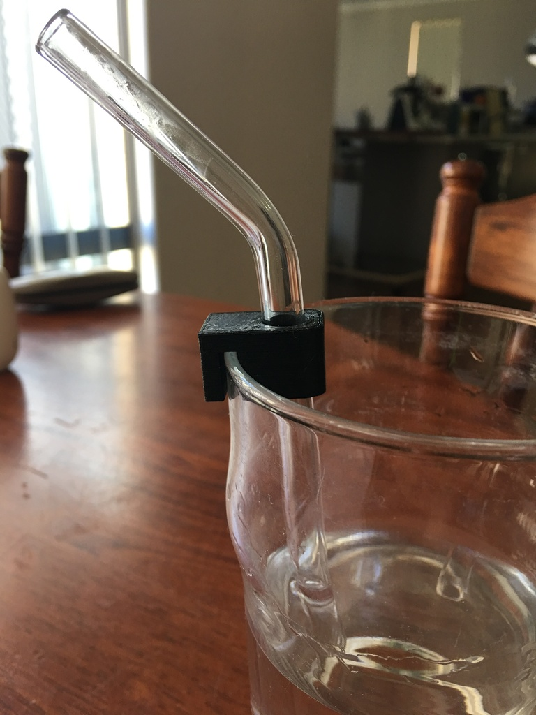 6) Drinking Straw Holder - Developed to help make sure the straw in a drinking glass stays in place. The straw holder is made to fit regular sized straws, and is easily mounted on a drinking glass.